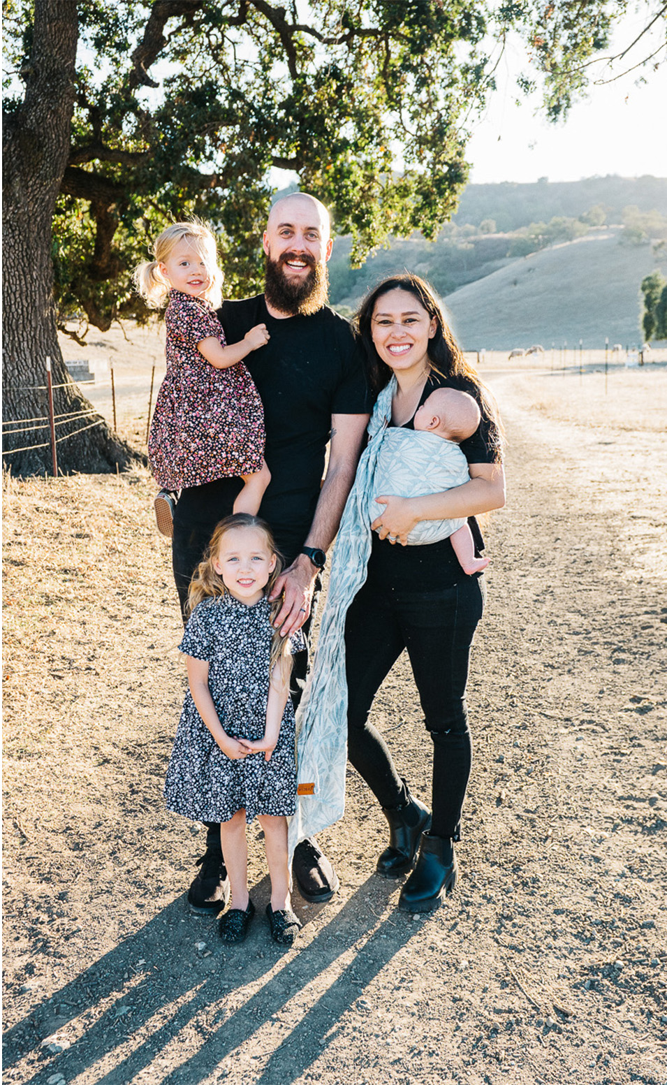 photo of the Whittaker family: mom, dad, and three kids.